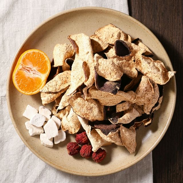 陈皮搭配新鲜柑橘茯苓山楂食材平铺展示